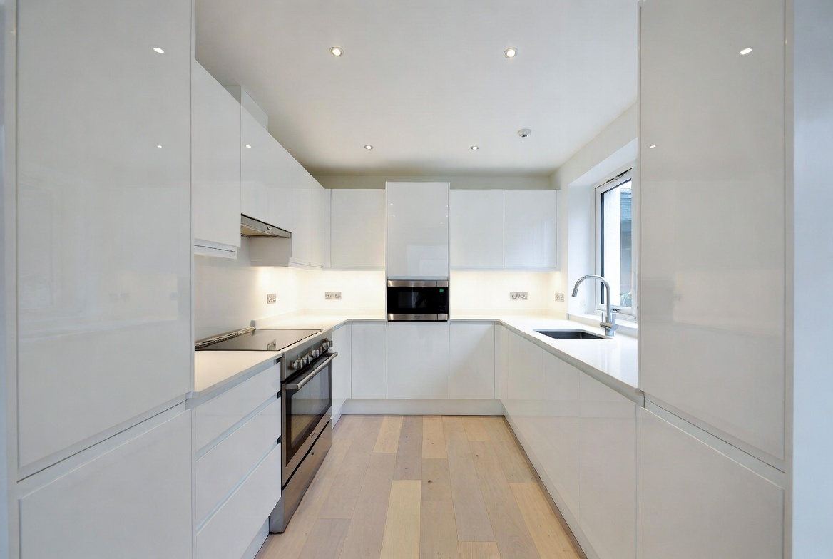 high gloss white kitchen renovation Pretoria by Xtreme Renovations