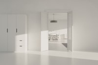 murphy wall bed modern white bedroom folded up - Xtreme Renovations Pretoria